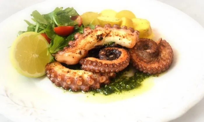 Cooked octopus with sides