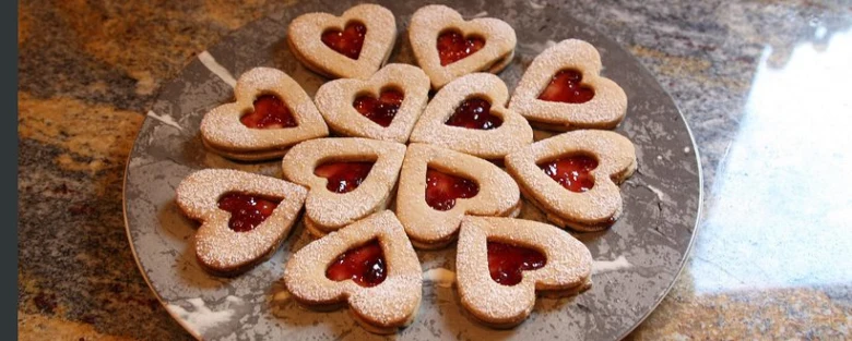 Heart-shaped linzer cookies with jam filling