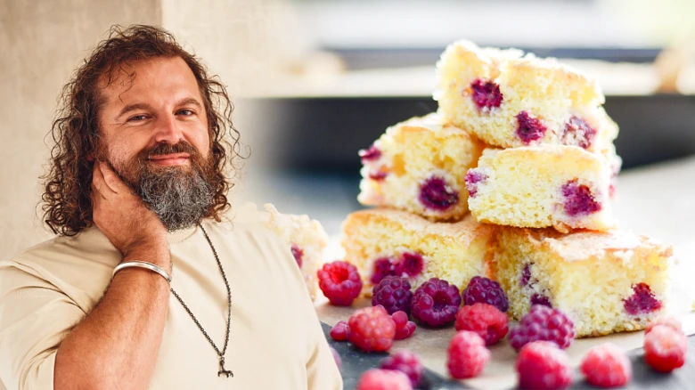 Man with cake and raspberries