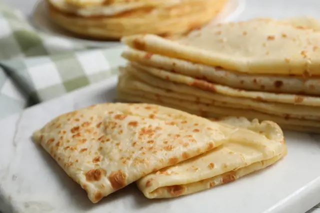 Folded crepes on plate