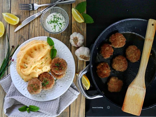 Homemade meat patties cooking and served